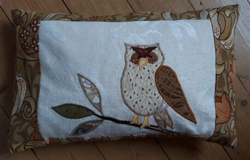 Louise Bell Quilts, Owl cushion, gold, left