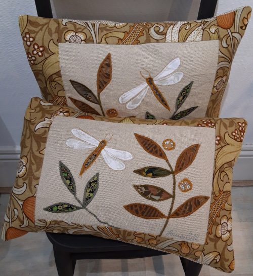 Pair of Dragonfly cushions, one flying right and one left.