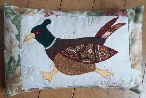 Pheasant running left cushion.